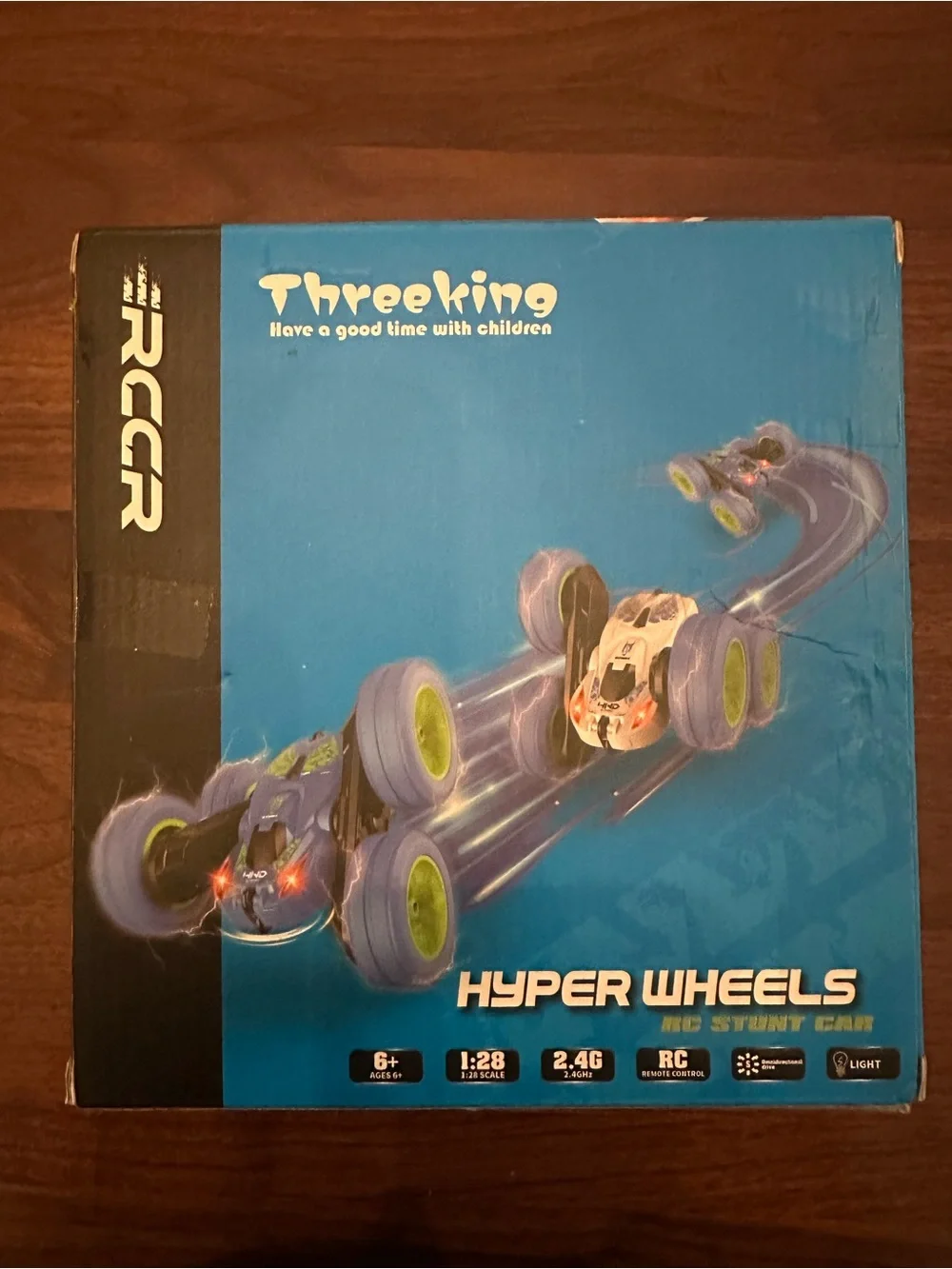 Never opened, NWT  Hyper Wheels RC Stunt Car - Blue with Green Wheels
